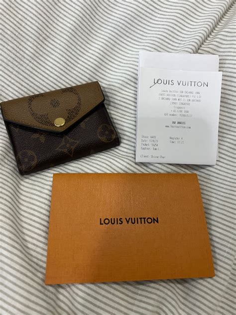 Products by Louis Vuitton: Zoé Wallet.